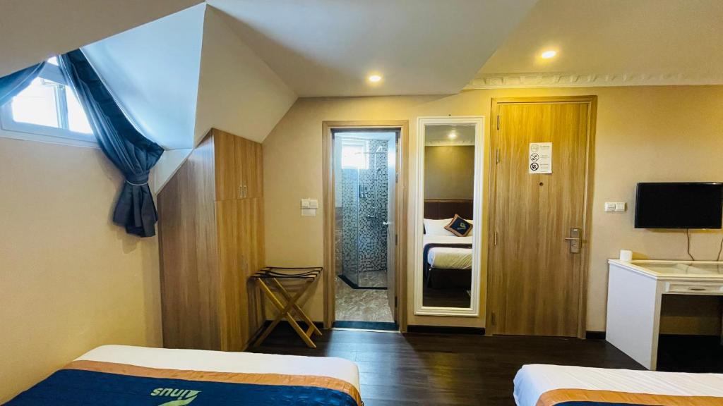 TV a/nebo společenská místnost v ubytování Pinus Hotel