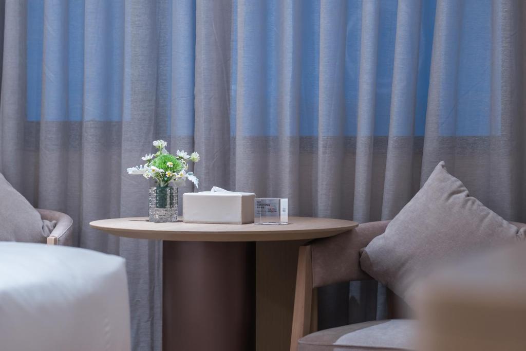 Posezení v ubytování Crystal Orange Hotel - Shenzhen Nanshan Xinhaofang Branch