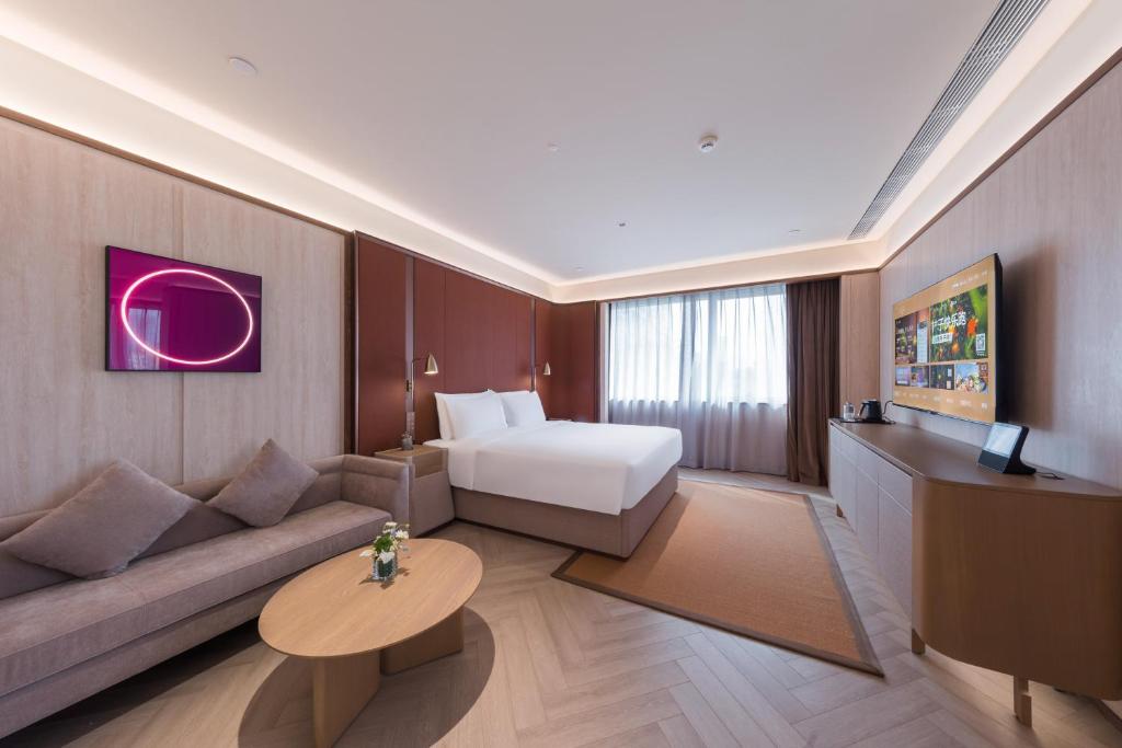 Posezení v ubytování Crystal Orange Hotel - Shenzhen Nanshan Xinhaofang Branch