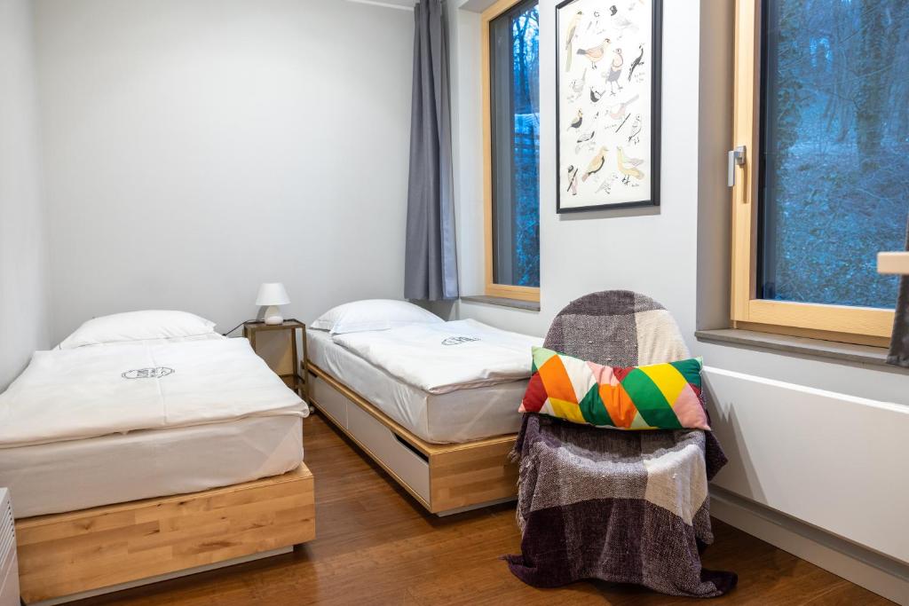 Rúm í herbergi á Nomád Glamping