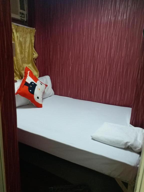Postel nebo postele na pokoji v ubytování New Fortunate Guest House A1