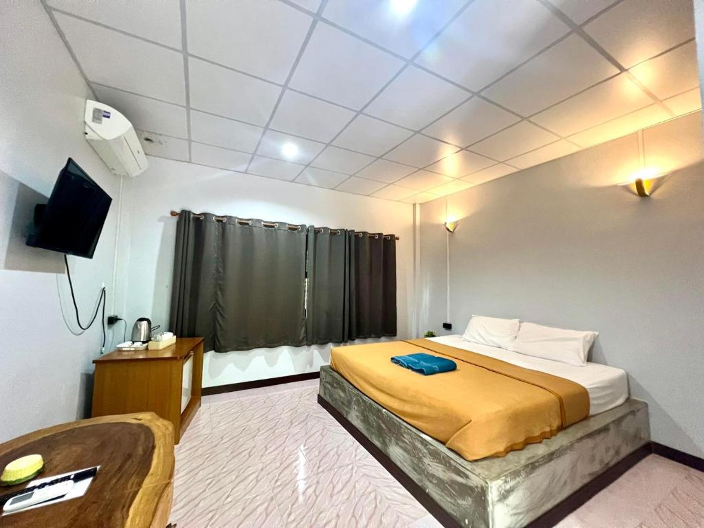 Cama o camas de una habitación en Lovely Lanta Resort
