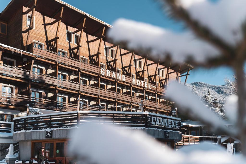 a view of a building with a ski lodge at Grand Hôtel & Spa NUXE Serre Chevalier in Saint-Chaffrey