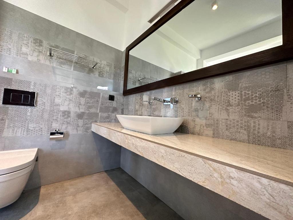 Koupelna v ubytování Mzion Hotel Weligama
