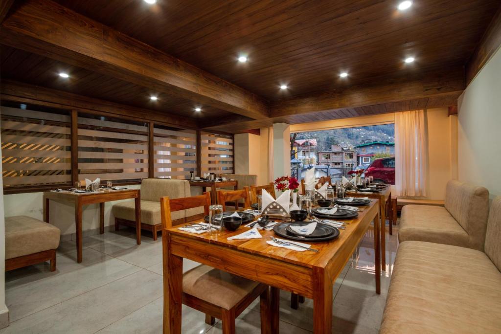 Posezení v ubytování Tripli Hotels Drilbu Manali