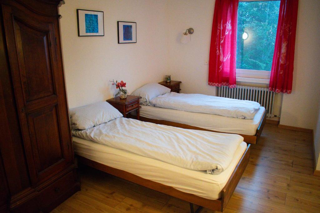 Postel nebo postele na pokoji v ubytování Hotel Malixerhof