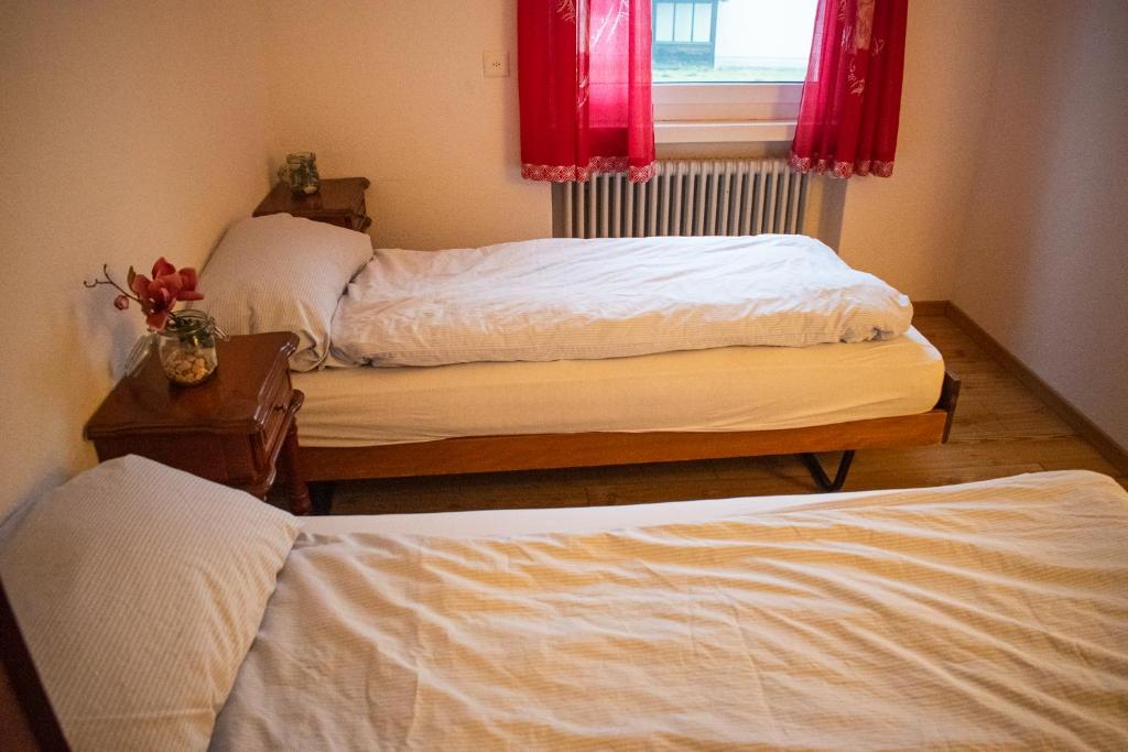 Postel nebo postele na pokoji v ubytování Hotel Malixerhof