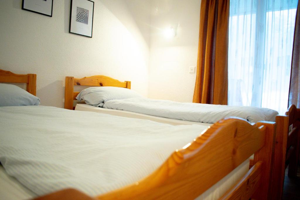 Postel nebo postele na pokoji v ubytování Hotel Malixerhof