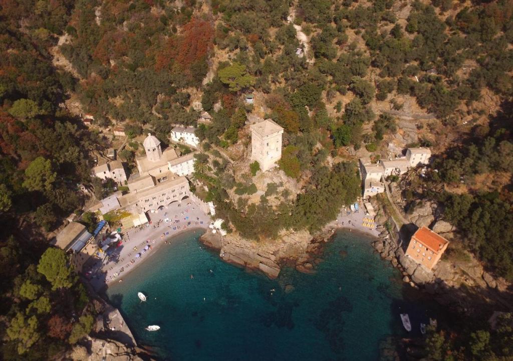 an aerial view of a castle on an island in the water at Agririfugio Molini in Camogli