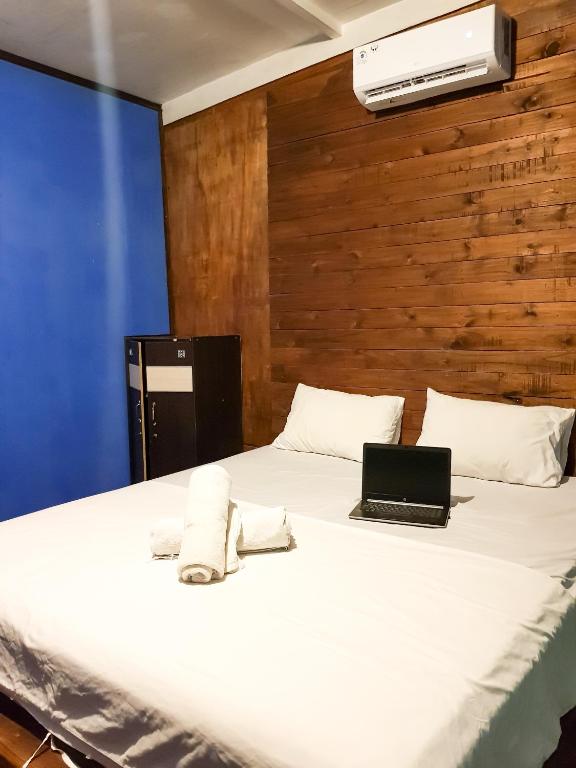 Postel nebo postele na pokoji v ubytování Leaf Coco Bungalow