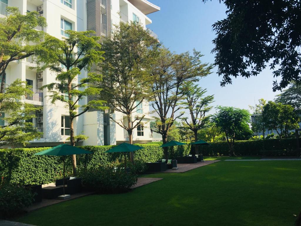 Foto dalla galleria di N8-SereneLake Lakeside湖景泳池，清迈最高端小区，近机场，网红餐厅，步行5分钟左右可以到7-11便利店 a Chiang Mai