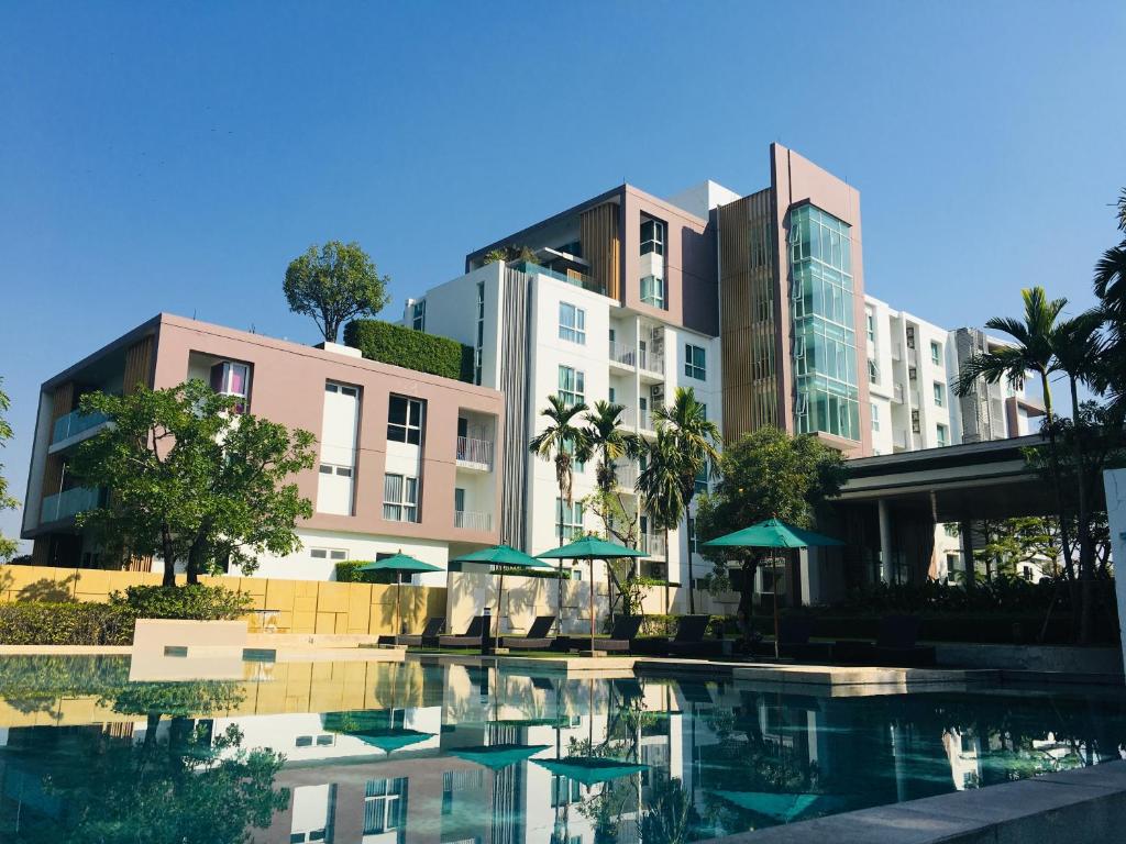 Foto dalla galleria di N8-SereneLake Lakeside湖景泳池，清迈最高端小区，近机场，网红餐厅，步行5分钟左右可以到7-11便利店 a Chiang Mai