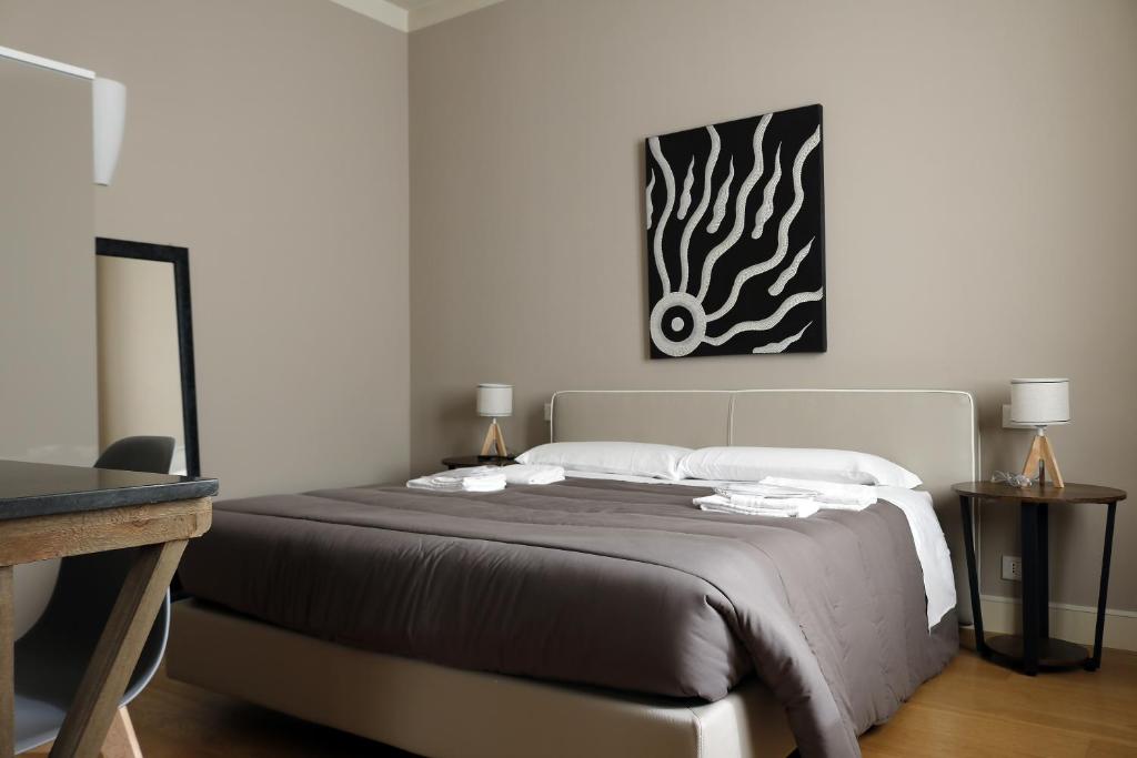 Postel nebo postele na pokoji v ubytování Albergo '900