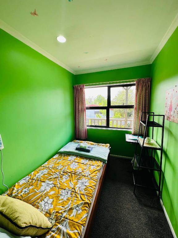 Postel nebo postele na pokoji v ubytování Dora's Comfortable Homestay in Hamilton