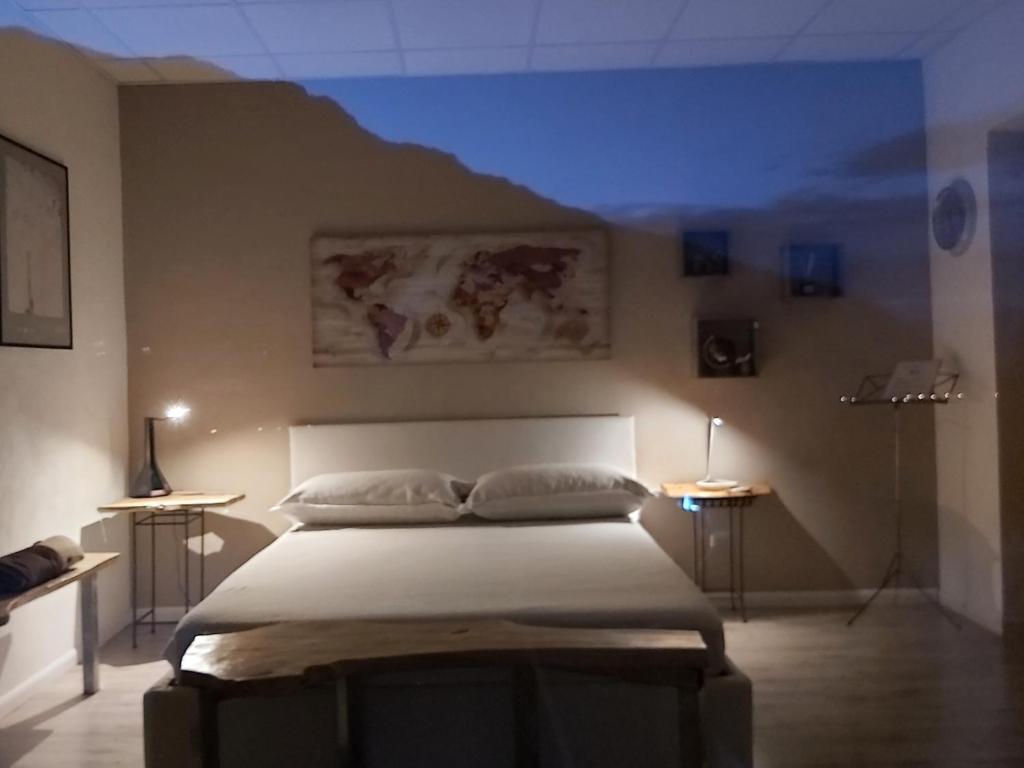 Postel nebo postele na pokoji v ubytování B&B VALCHISONE