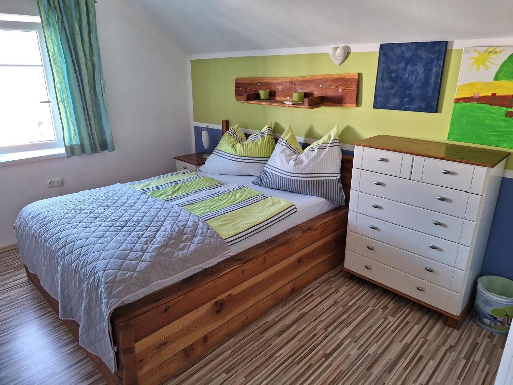 Postel nebo postele na pokoji v ubytování Ferienhaus Tüchler