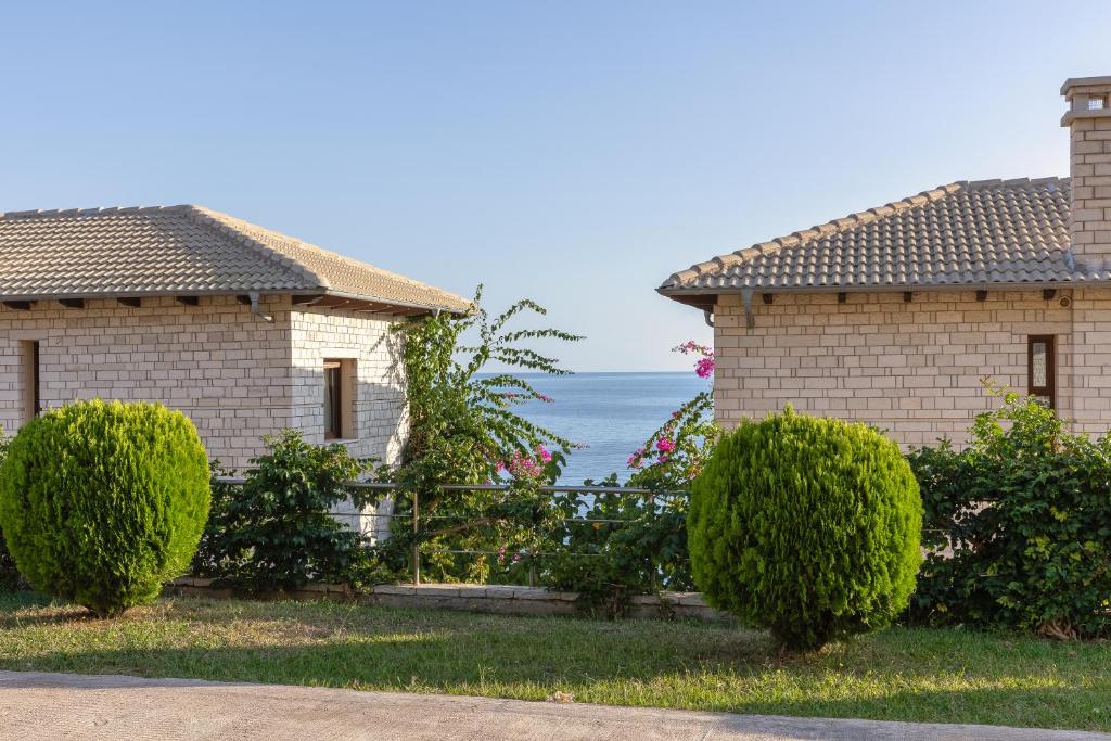 a house with a view of the ocean at Costa Smeralda in Syvota