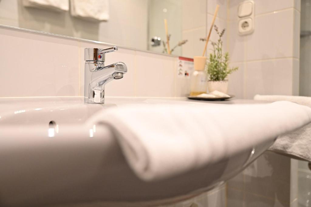 Koupelna v ubytování Land-gut Hotel zum Löwen Garni