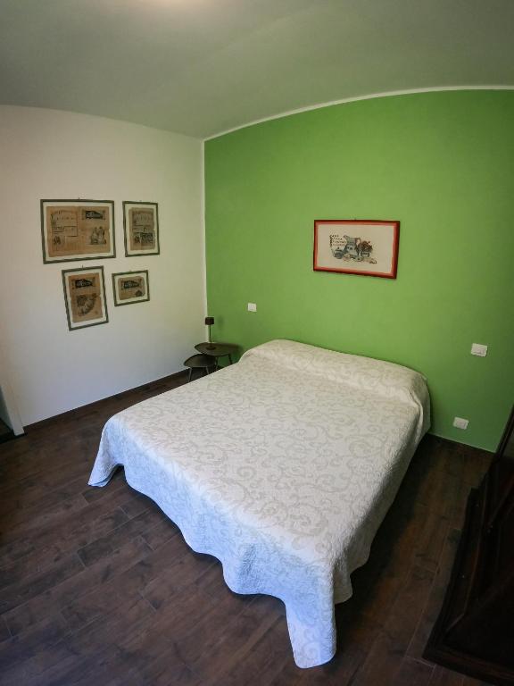 Postel nebo postele na pokoji v ubytování I TRE LADRONI