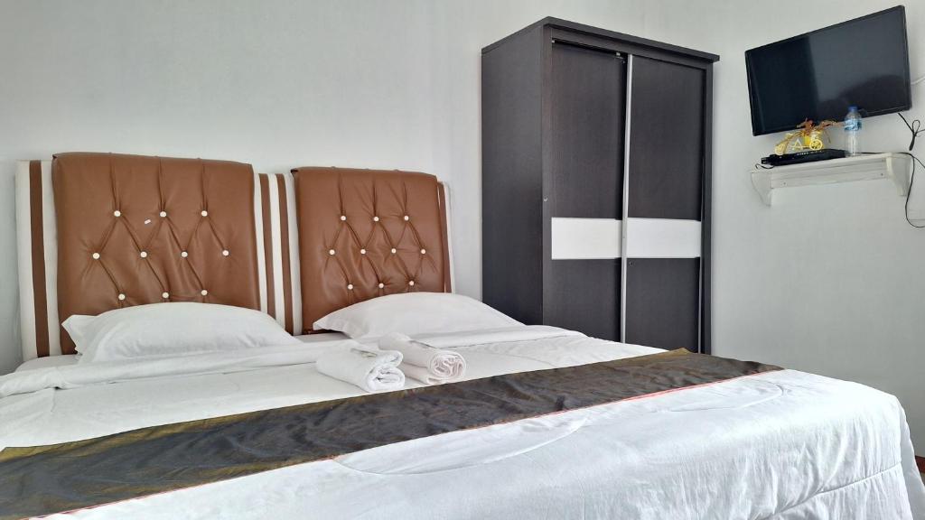 Harisha Homestay Sawah Lunto Syariah Redpartner - Housity