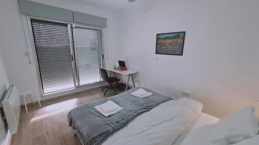 Postel nebo postele na pokoji v ubytování STAY Mystique City Penthouse