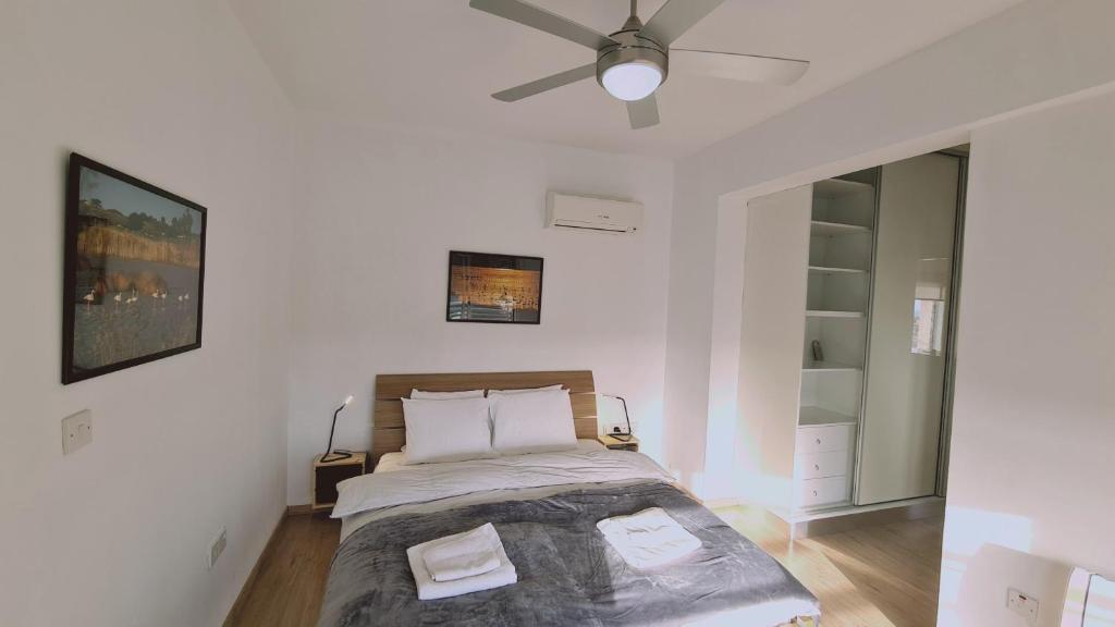 Postel nebo postele na pokoji v ubytování STAY Mystique City Penthouse