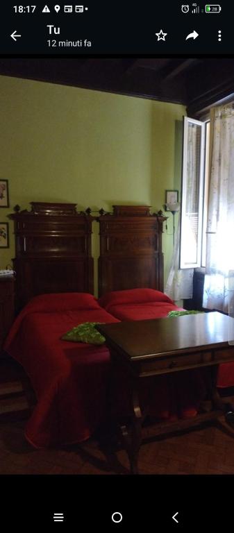 Postel nebo postele na pokoji v ubytování B&B Amarantha Gothica Genoa