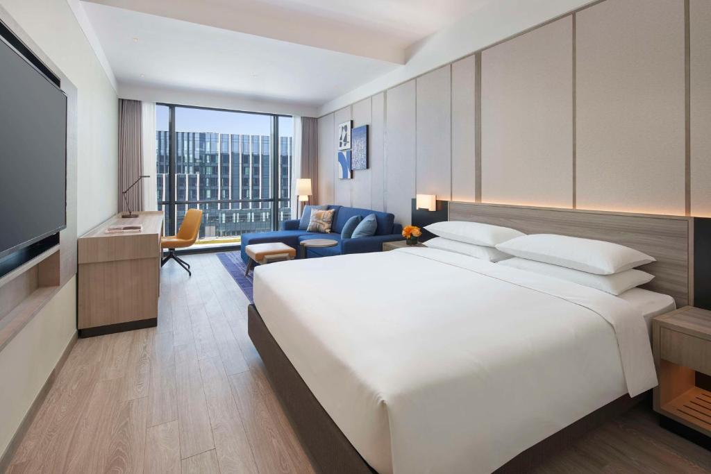 Hyatt Place Hangzhou International Airportにあるベッド