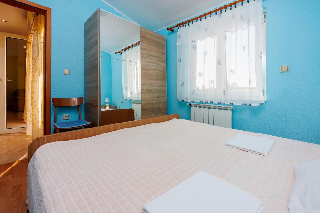 Posteľ alebo postele v izbe v ubytovaní Apartment Blazic