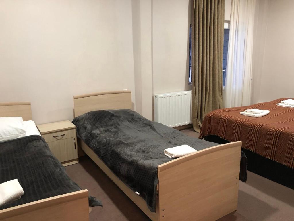 Postel nebo postele na pokoji v ubytování Guest House Vanda