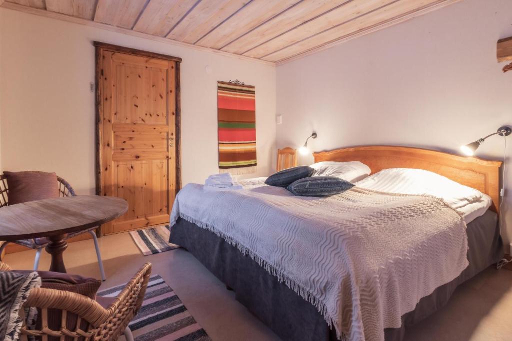Postel nebo postele na pokoji v ubytování Kalix Riverside inn