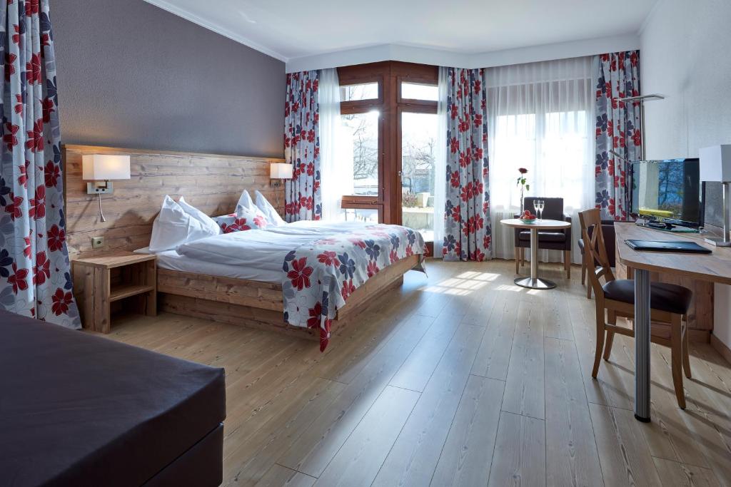 Postel nebo postele na pokoji v ubytování See & Wellnesshotel Gerbi