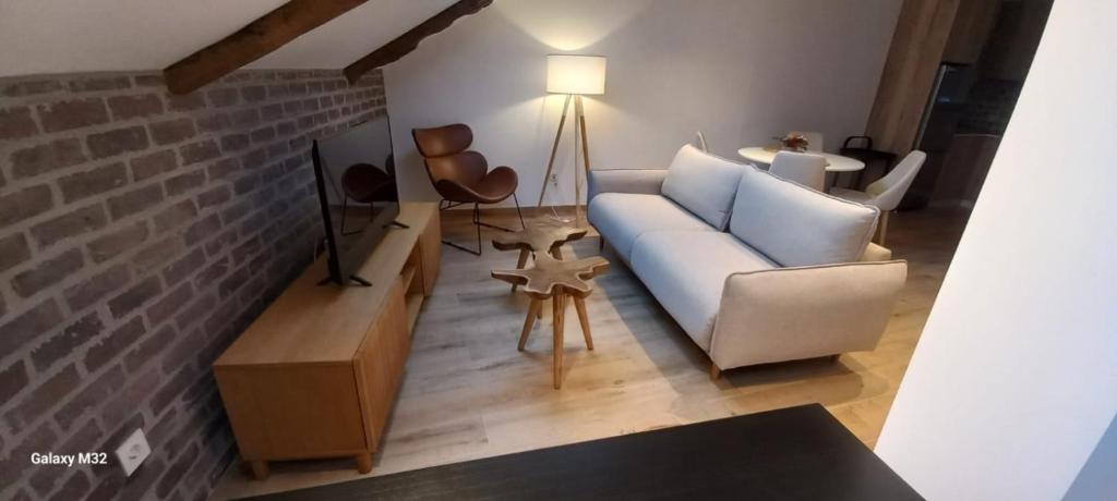 A seating area at SUITES BERRUETA , Plaza Mayor by Albany