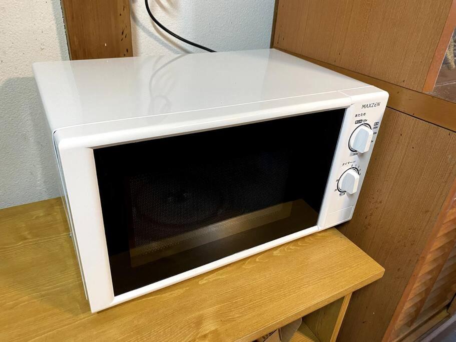 Kuchyň nebo kuchyňský kout v ubytování FTH Azure Atami