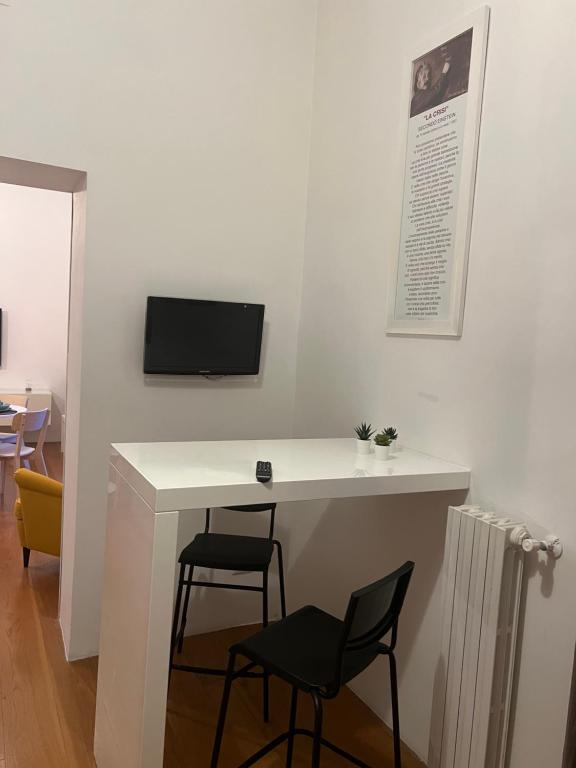 TV a/nebo společenská místnost v ubytování Terrazza Vanvitelli