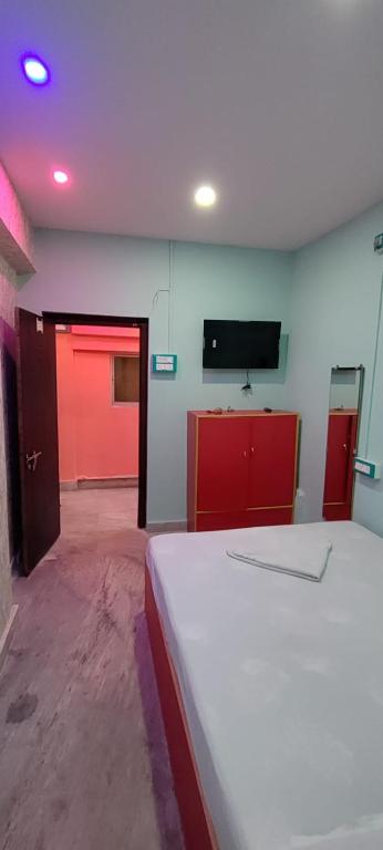 Postel nebo postele na pokoji v ubytování Tusthi Banquets