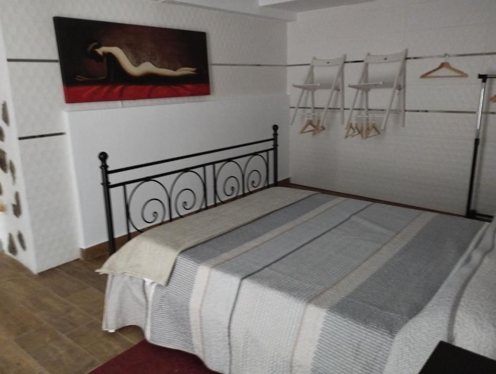 Postel nebo postele na pokoji v ubytování Las palmeras