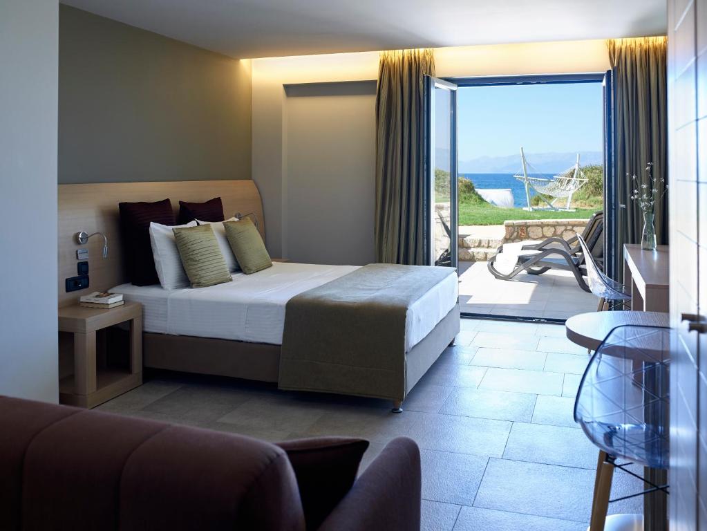 Postel nebo postele na pokoji v ubytování Alas Resort & Spa
