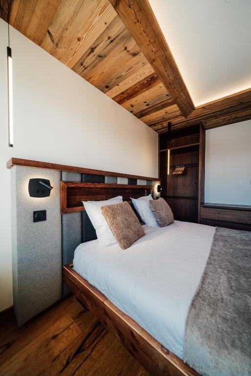 Postel nebo postele na pokoji v ubytování Appartement Pixel by ExplorHome