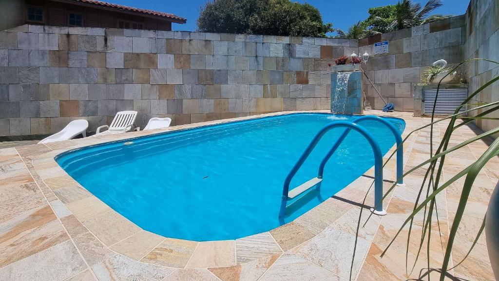 Bazén v ubytování Piscina Aquecida , SPA, Bilhar, Ar Cond, Wi-Fi nebo v jeho okolí