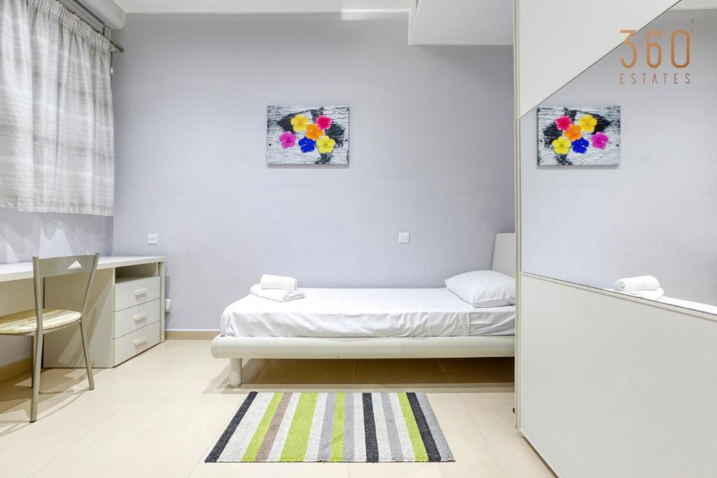 Postel nebo postele na pokoji v ubytování Charming 2BR home w/access to pool in Marsaskala by 360 Estates