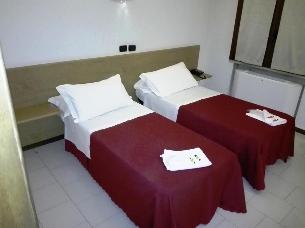 Postel nebo postele na pokoji v ubytování Hotel Motel Est