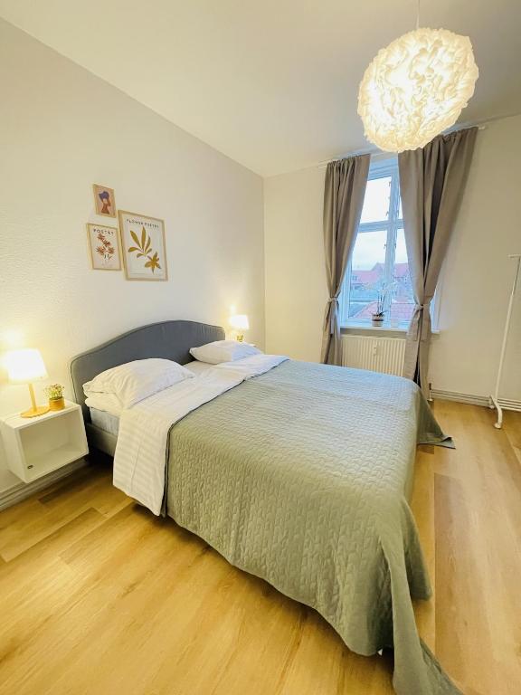 Postel nebo postele na pokoji v ubytování aday - The Swanky Suite