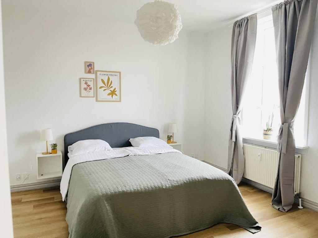 Postel nebo postele na pokoji v ubytování aday - The Swanky Suite