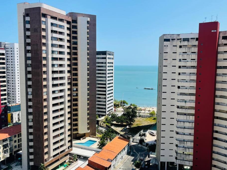 a view of some tall buildings in a city at Condo c/2 Suites a 200m da Beira Mar - Vista Mar in Fortaleza
