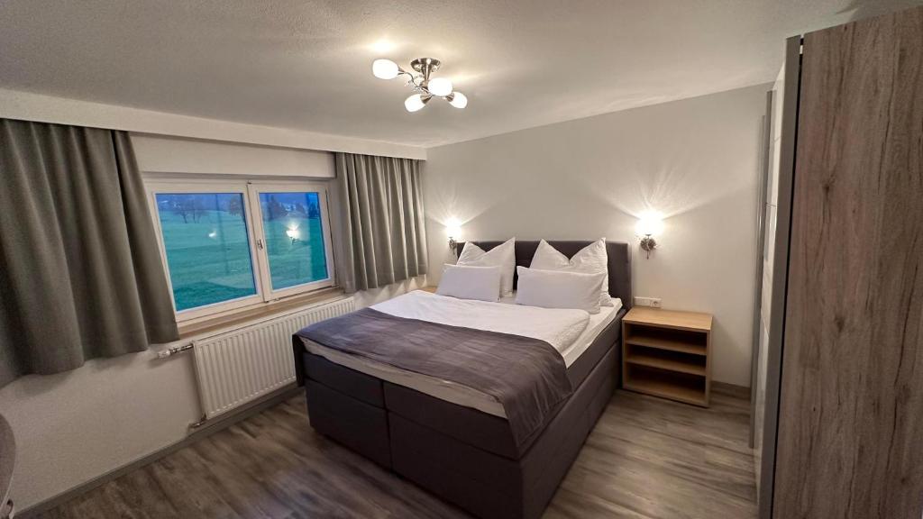 Una cama o camas en una habitación de Haus Wurzenrainer