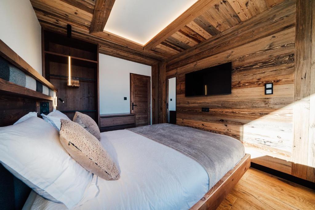 Postel nebo postele na pokoji v ubytování Appartement Pixel by ExplorHome