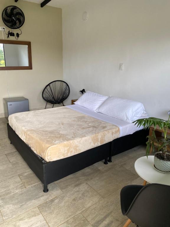 Una cama o camas en una habitación de Baum Hotel