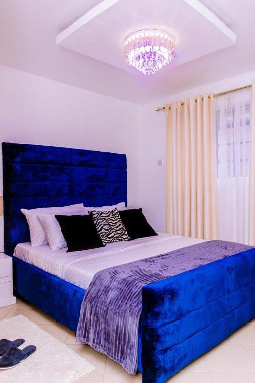 Postel nebo postele na pokoji v ubytování Juston Homes AirBNB kisii