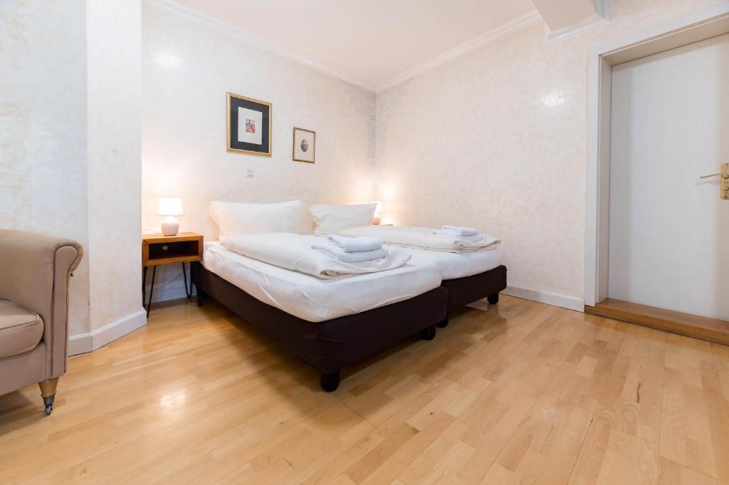Postel nebo postele na pokoji v ubytování Hotel Leone d´Oro